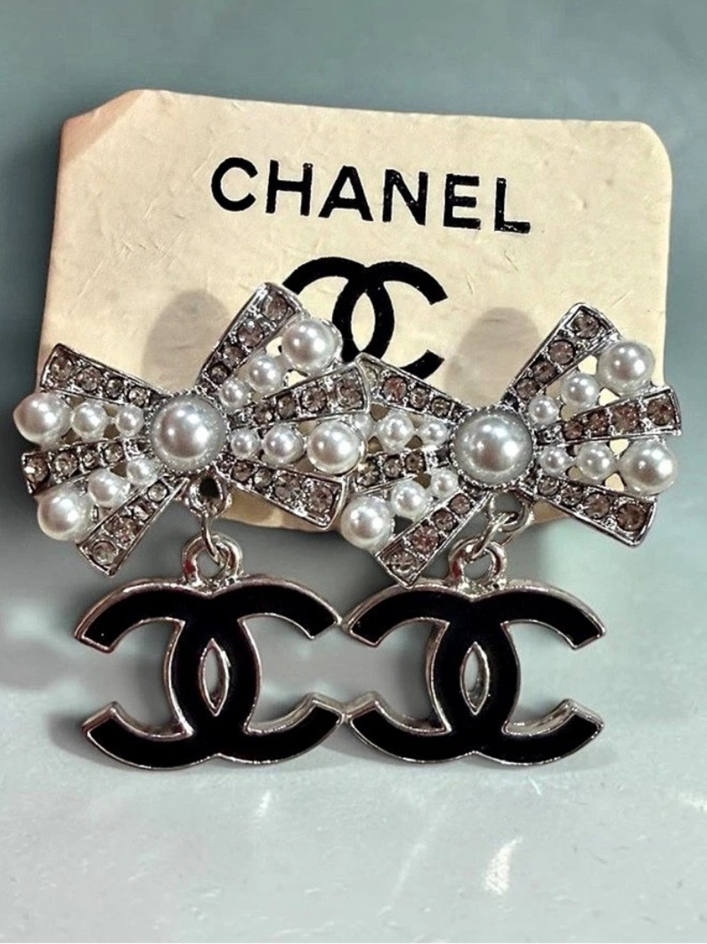 Pearl Bow Logo Drop Earrings Black & Silver | New